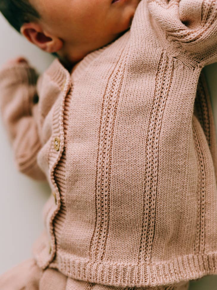 Conjunto de chaqueta y pantalón rosa
